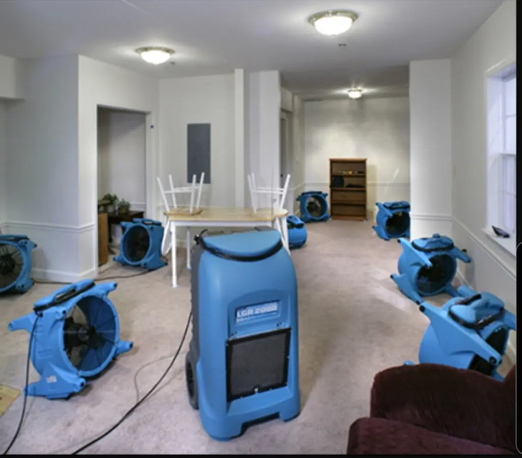 Air movers and dehumidifier setup for Water Damage Restoration in Granger